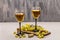 Wine glasses, fresh grapes and corks on wooden chopping board. Wine bar, winery, wine tasting concept