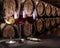 Wine glasses on the old wooden table. Winetasting at the wine cellar