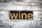 Wine Letterpress Word on Wooden Background