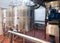 Wine material processing in tanks at plant