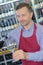 Wine merchant pouring glass wine