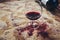 Wine mishap Red wine spills on carpet, creating a stain