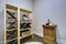 Wine room with wooden wine racks and wine tasting table.