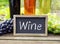 Wine sign with grapes and bottles