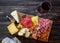 Wine snack. Prosciutto, Parma ham, salami, almonds, olives, baguette, blue cheese, parmesan. Antipasti