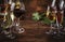 Wine tasting concept, still and sparkling wines. Red, white wine, rose and champagne in wine glasses on vintage wooden table