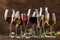 Wine tasting, still and sparkling wines. Red, white wine, rose and champagne ÑˆÑ‚ assortment in wine glasses on vintage wooden