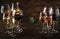 Wine tasting, still and sparkling wines. Red, white wine, rose and champagne ÑˆÑ‚ assortment in wine glasses on vintage wooden