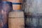 Wine tasting in winery - Wooden barrels and bottles of aged excelent wine