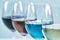 Wine Varieties. Four Glasses of Wine on Table â€“ Red Wine, Rose, White and Blue Wine
