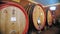 wine warehouse. wine Vault. Many large wooden barrels of wine are stored in the cellar of the winery. Storage Room for