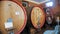 wine warehouse. wine Vault. Many large wooden barrels of wine are stored in the cellar of the winery. Storage Room for