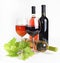 Wineglass, bottle of wine and leaf