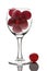 Wineglass full of grapes isolated