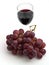 Wineglass with a grape bunch