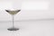 Wineglass. Martini glass. Glassware. Alcoholic drink. 3D render of a glass martini glass on a light matte background