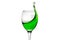 Wineglass with splashing drops of green alcohol cocktail