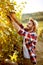 Winemaker cutting bunch of grapes in vineyardwinemaker cutting