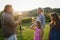 Winemaker family together in vineyard