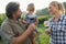 Winemaker family together in vineyard