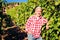 Winemaker Standing By His Vineyard