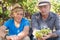 Winemakers father and son in vineyard