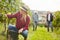 Winemakers manually harvesting grapes in the vineyard