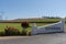 Winery entrance and a vineyard in Western Cape, South Afric