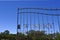 Winery Gate opens into a vineyard under clear blue sky