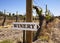 Winery Sign With Old Vines