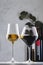 Wines assortment. Red, white, rose wine in glasses and bottles on gray table background. Wine bar, shop, tasting concept