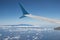 Wing airplane above Atlantic Ocean with view at Tenerife