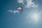 Wing Foiling kitesurfing wind surfing water outdoor sport in Baltic sea Dark blue clouds ocean water surface with foam