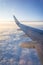 Wing passenger planes, blue sky and clouds. Travel concept.