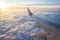 Wing passenger planes, blue sunny sky and clouds. Travel concept.