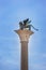 Winged St Mark Lion Venice symbol on its column. Italy.