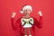 Winner announced. Happy santa man. Christmas elf scream making winning gesture. Merry Christmas