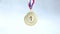 Winner or champion gold trophy medal on concrete stone grey background. Victory first place of competition. Winning or