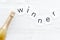 Winner congratulation concept with champagne on white wooden background top view copy space