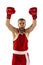 Winner emotions. Male boxer in red uniform and boxing gloves training isolated on white background. Strength, attack and