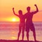 Winning success concept - happy beach couple