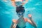Winning summer vacation gesture - boy underwater