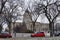 WINNIPEG, CANADA - 2014-11-16: Cars on winter Memorial Boulevard in front of Manitoba Legislature building. This