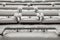 Winter abstraction. Benches for spectators covered in snow