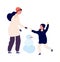 Winter activity. Mother son making snowman. Happy family walking outdoor in cold weather. Seasonal outfit, holidays