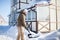 Winter activity, young man shoveling snow.