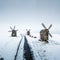 Winter aerial drone landscape with snow windmills