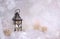 Winter background. Beautiful candlestick in the shape of a house in a snow fairy forest. Copy space