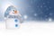 Winter background with a snowman, snow and snowflakes