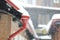 Winter background - snowy winter houses and drainpipes in defocus.